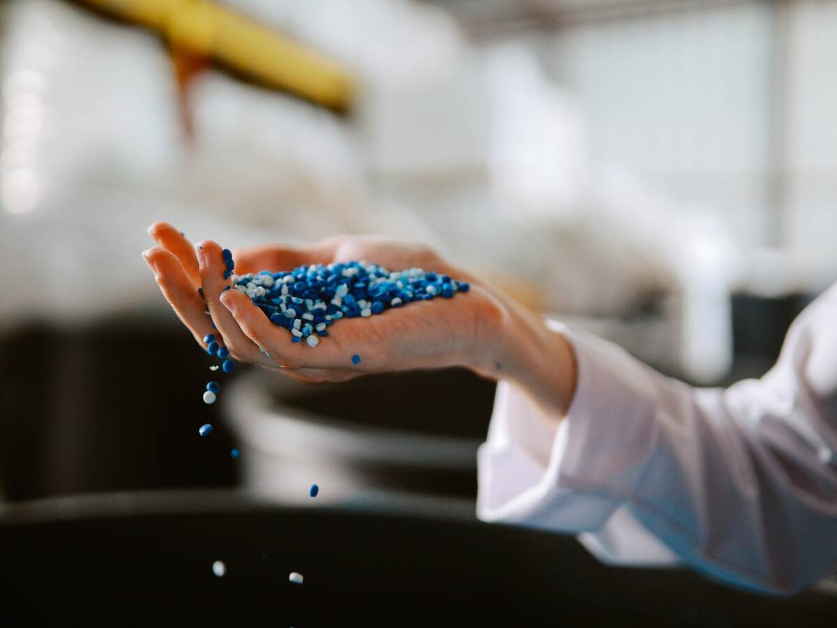 Hand inspecting plastic pellets