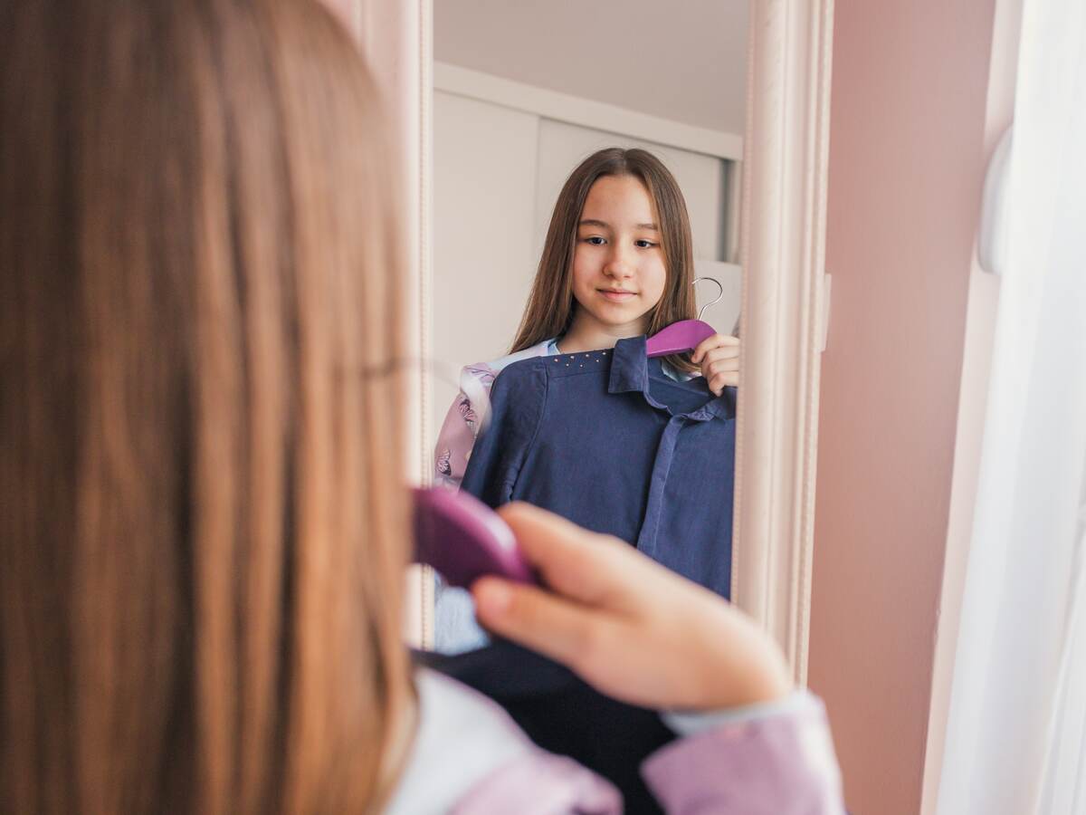 Girl chooses a dress