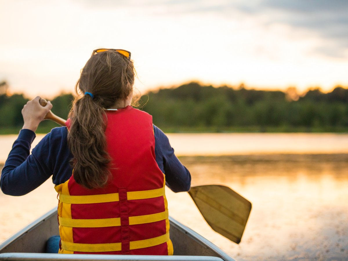 Woman wearing personal flotation device