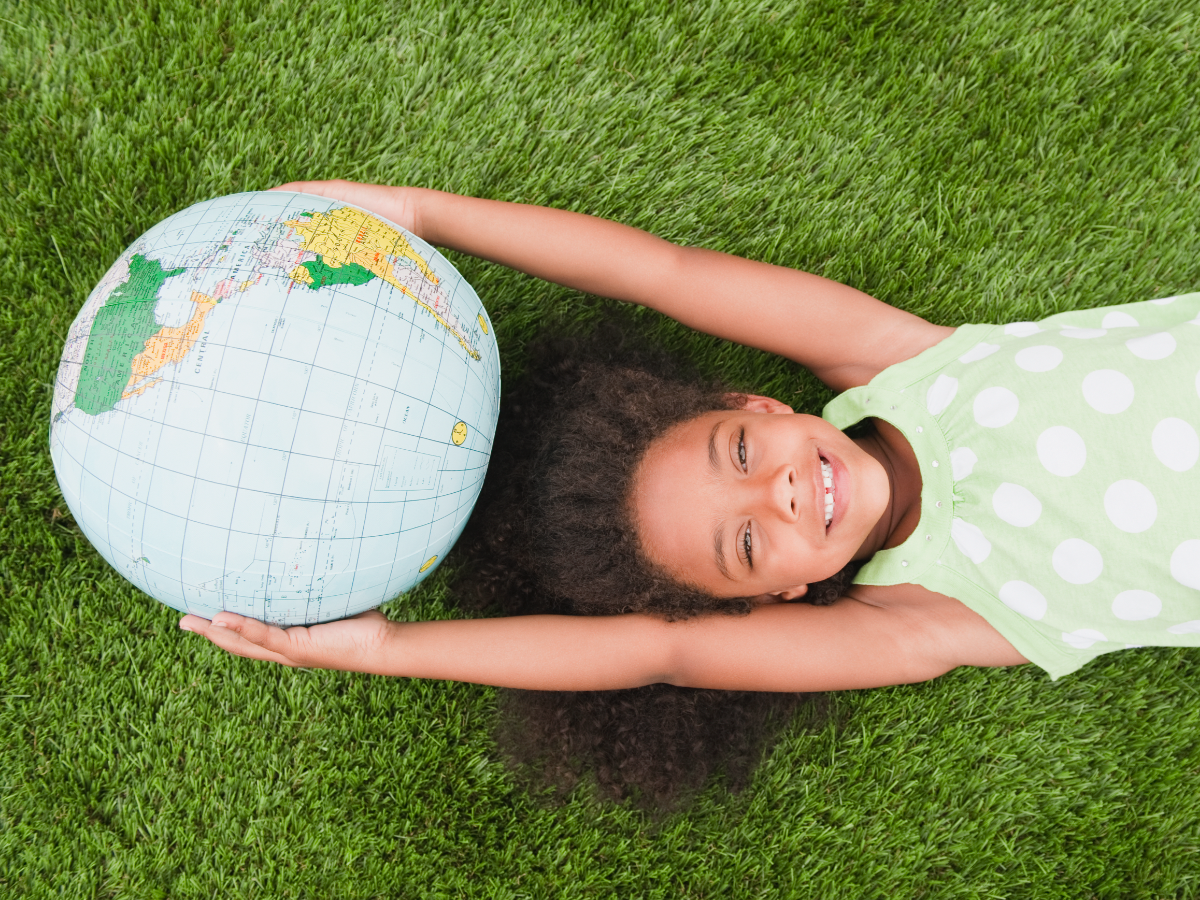 Child with a globe