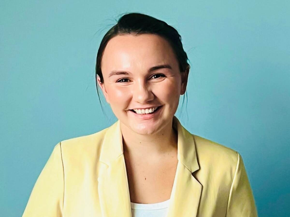 Closeup of UL employee Holly Tribuzio in yellow jacket. 