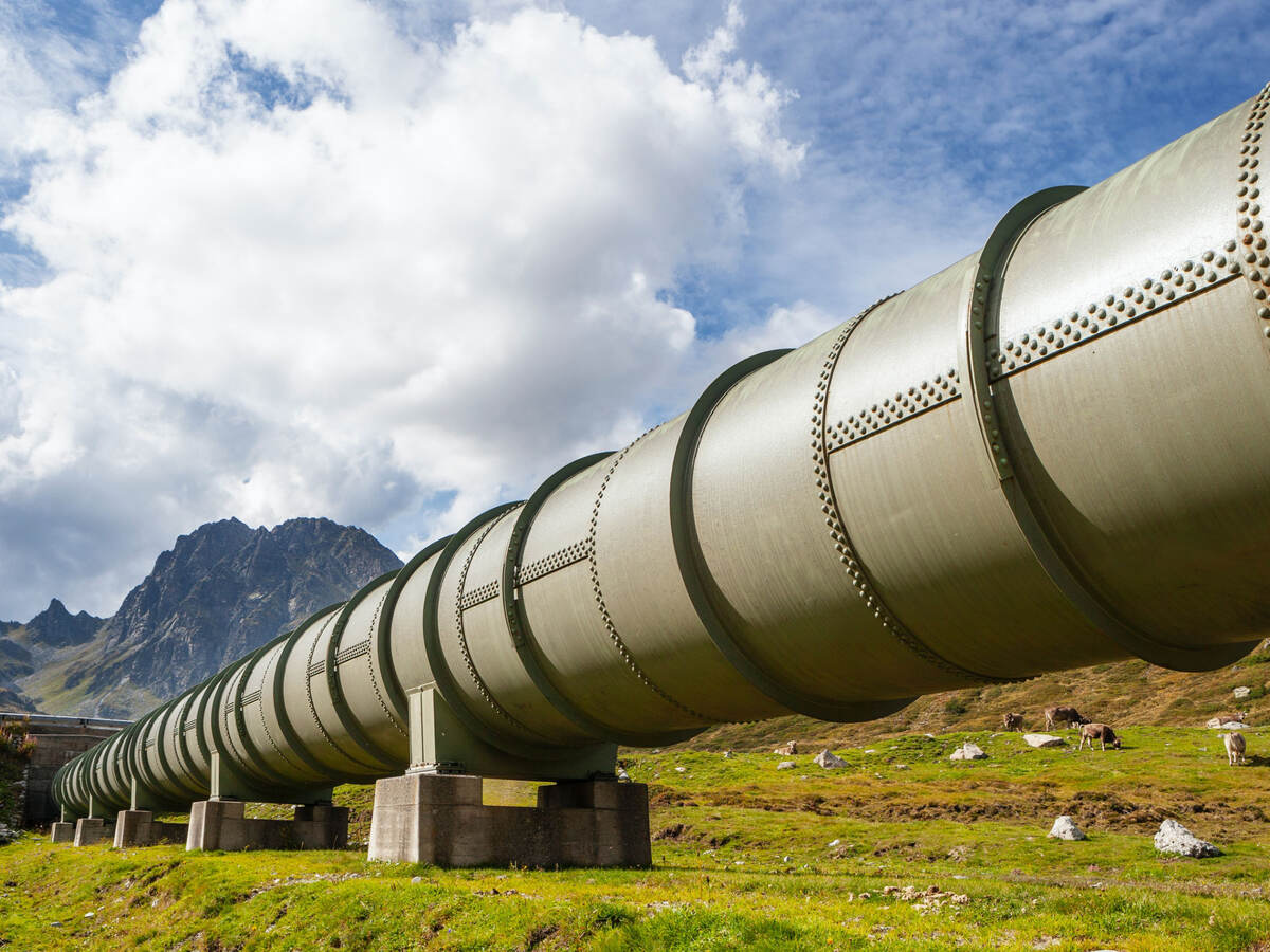 Large water system pipe in beautiful mountainous countryside