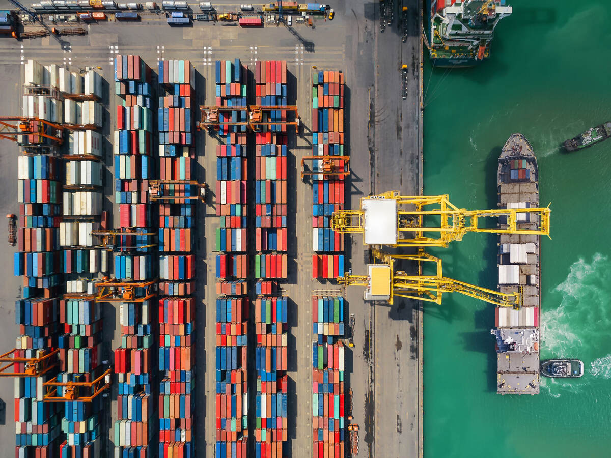 Shipping containers being loaded on a ship