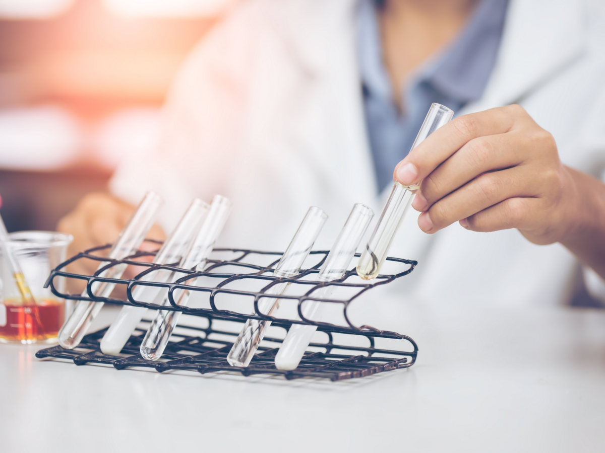 laboratory technician working with test tubes