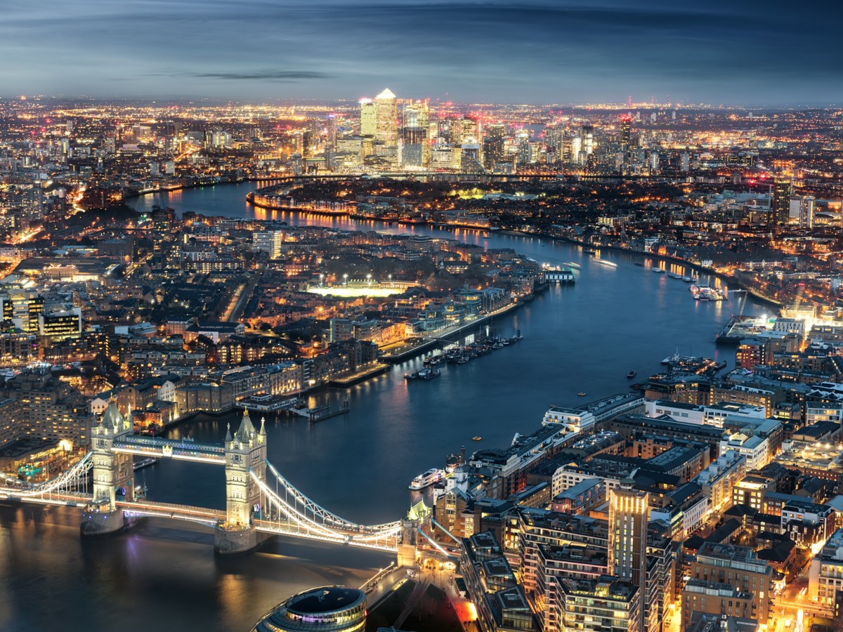 High Angle View Of Tower Bridge Over Thames River In Illuminated City At Night