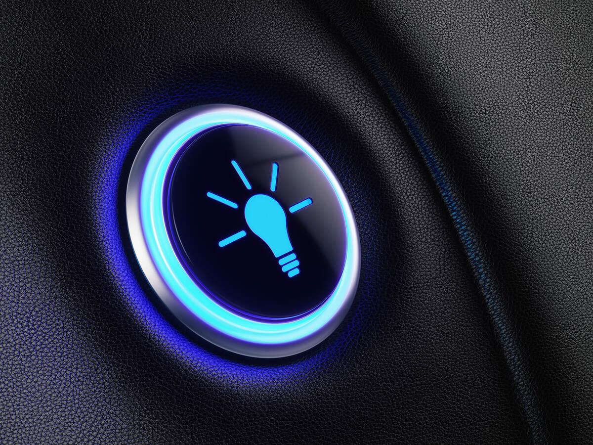 Image of a button with lightbulb icon glowing blue.