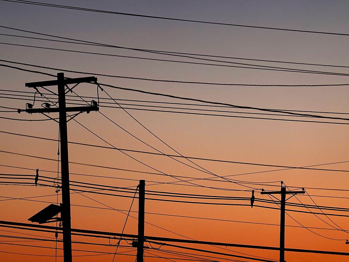 Electric poles at sunset.