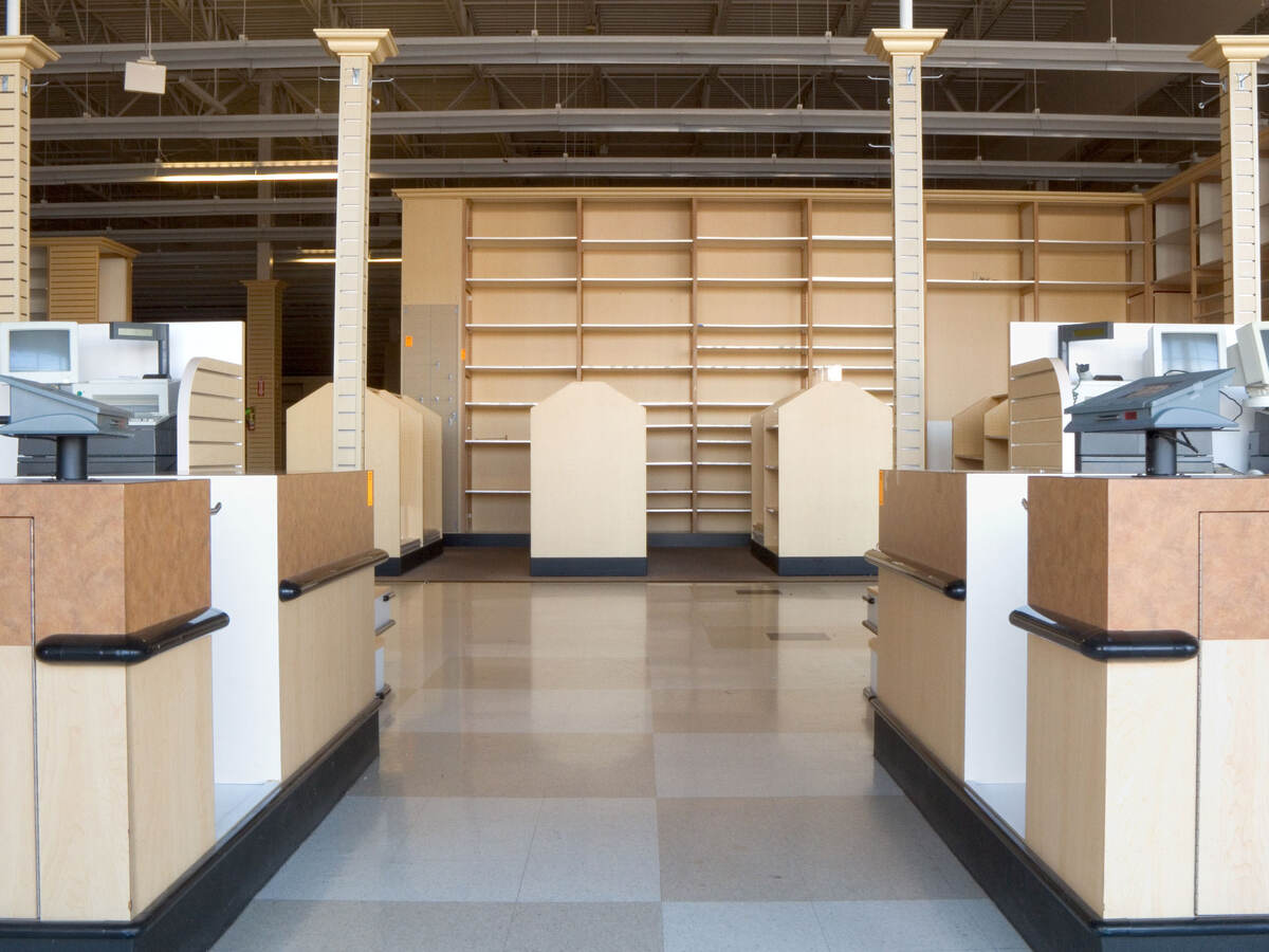 An empty retail store with checkered floors