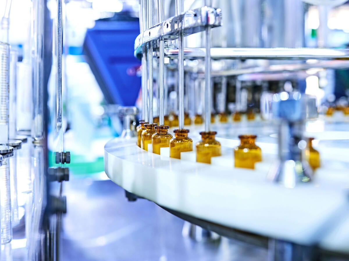 Glass medicine bottles on a factory line
