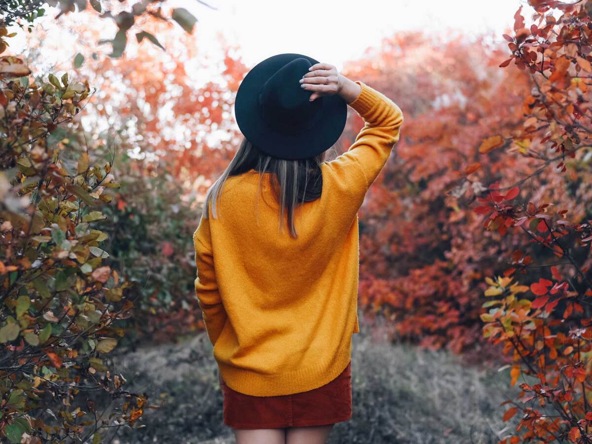 Luxury woman in autumnal landscape 