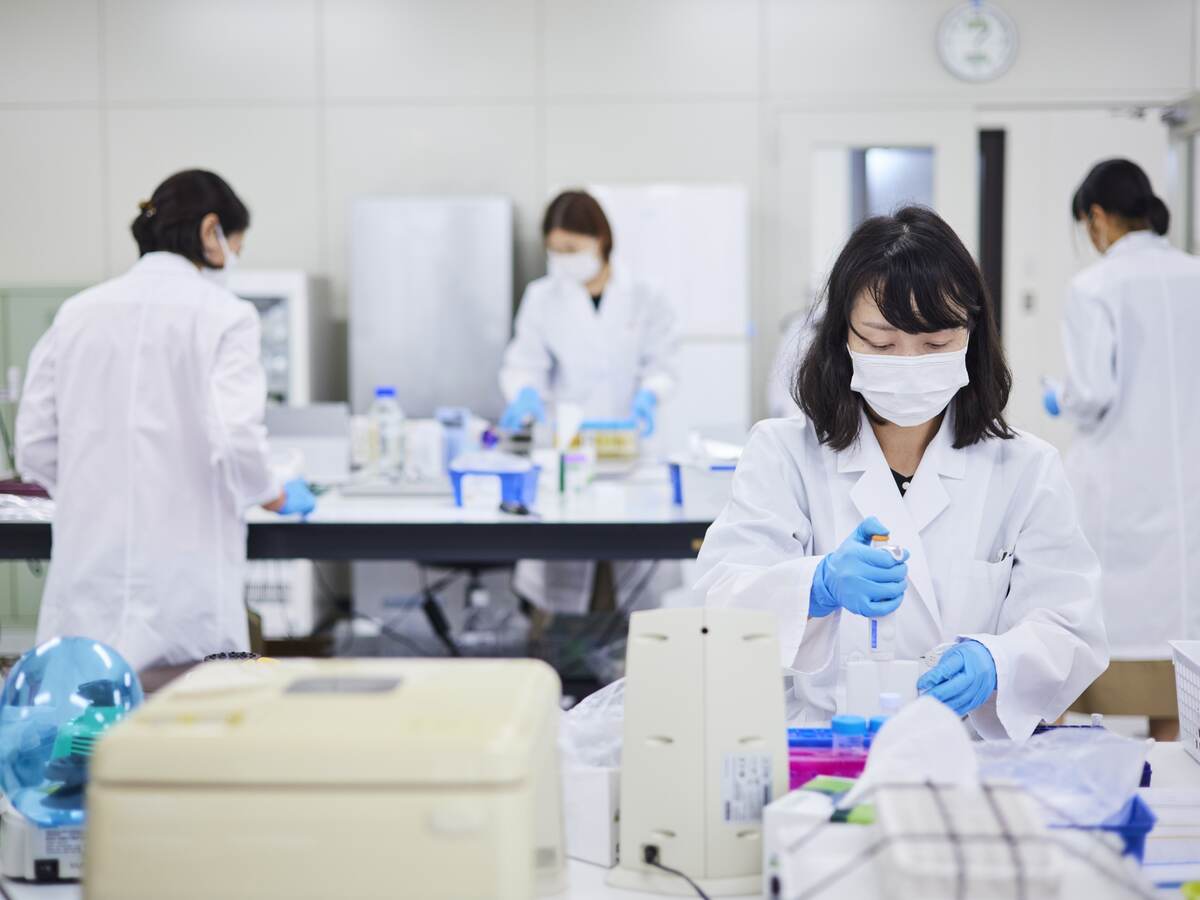 Life sciences laboratory technicians in Asia.