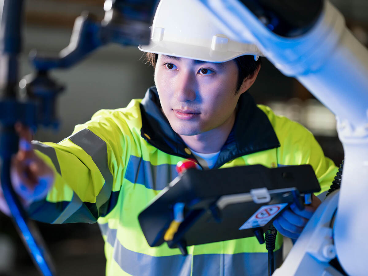 engineer checking robotics welding