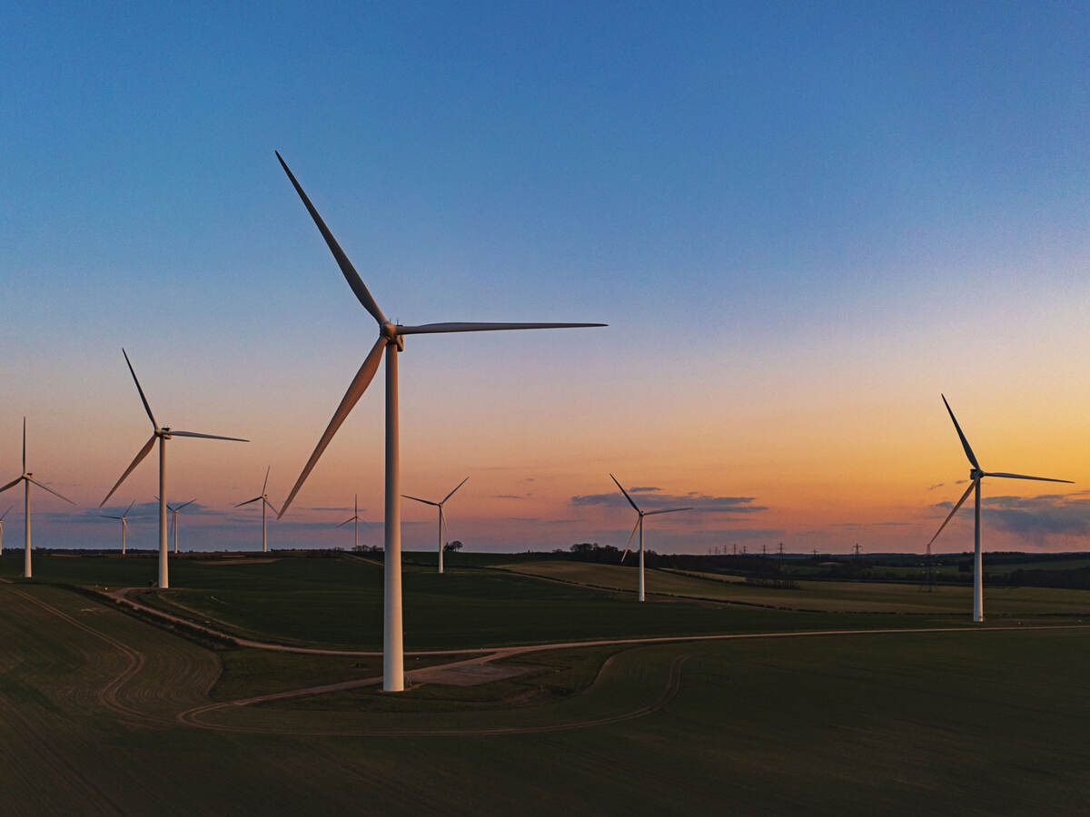 Drone view of a wind farm. Multiple wind turbines