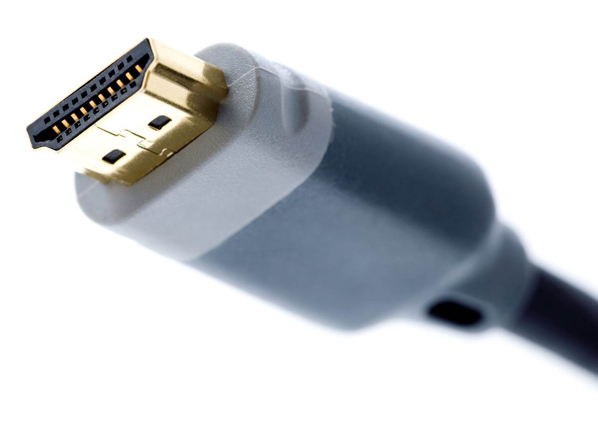 HDMI cable connector on white background.