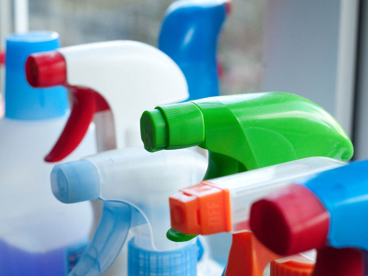 close-up of spray bottles in kitchen