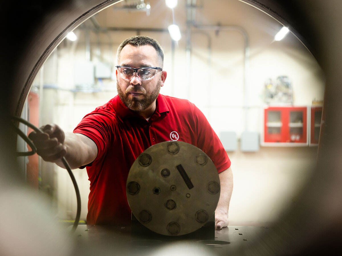 Person working with testing equipment