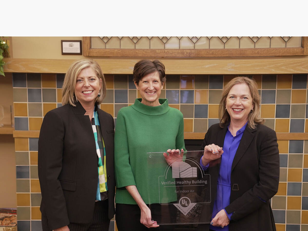 Jennifer Scanlon and others with an award