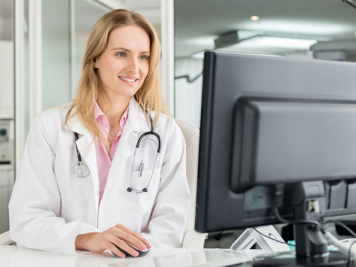 Doctor using a laptop