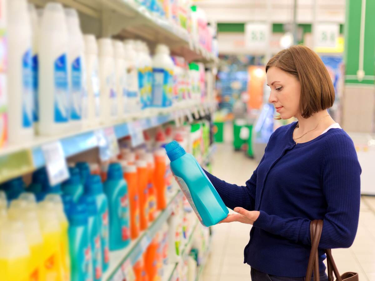 Woman buys washing powder.