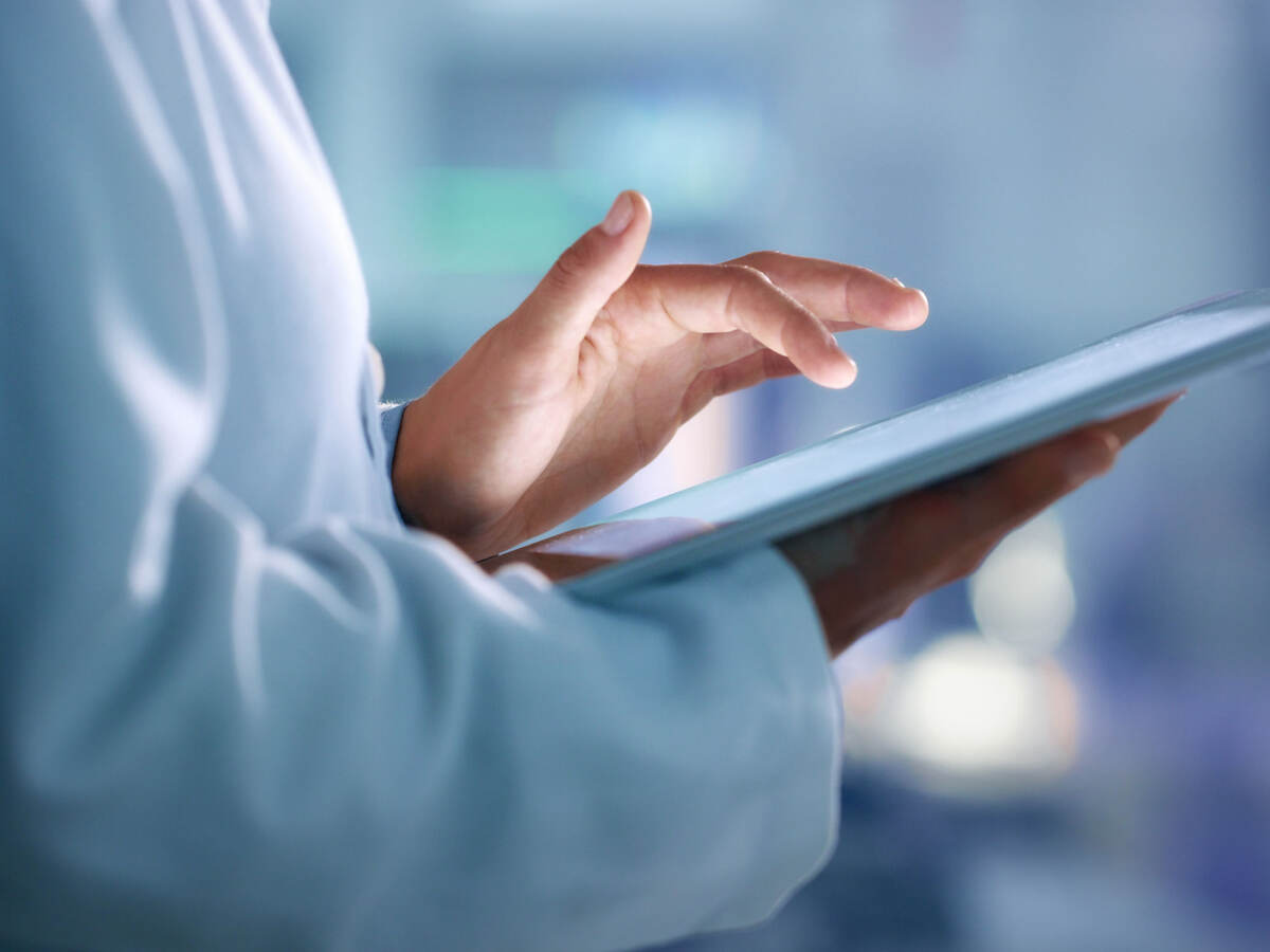 Doctor holding a tablet