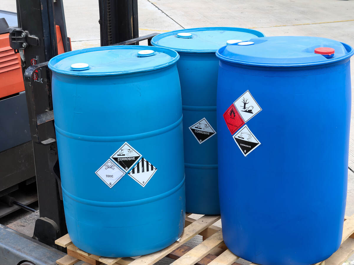 Warning symbol for chemical hazard on chemical containers