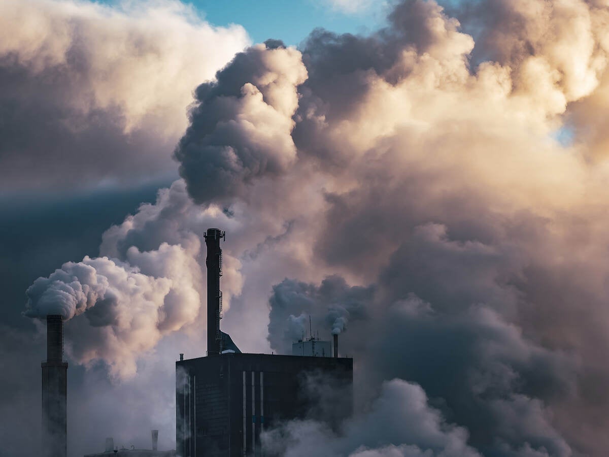 Emissions rising from smoke stacks