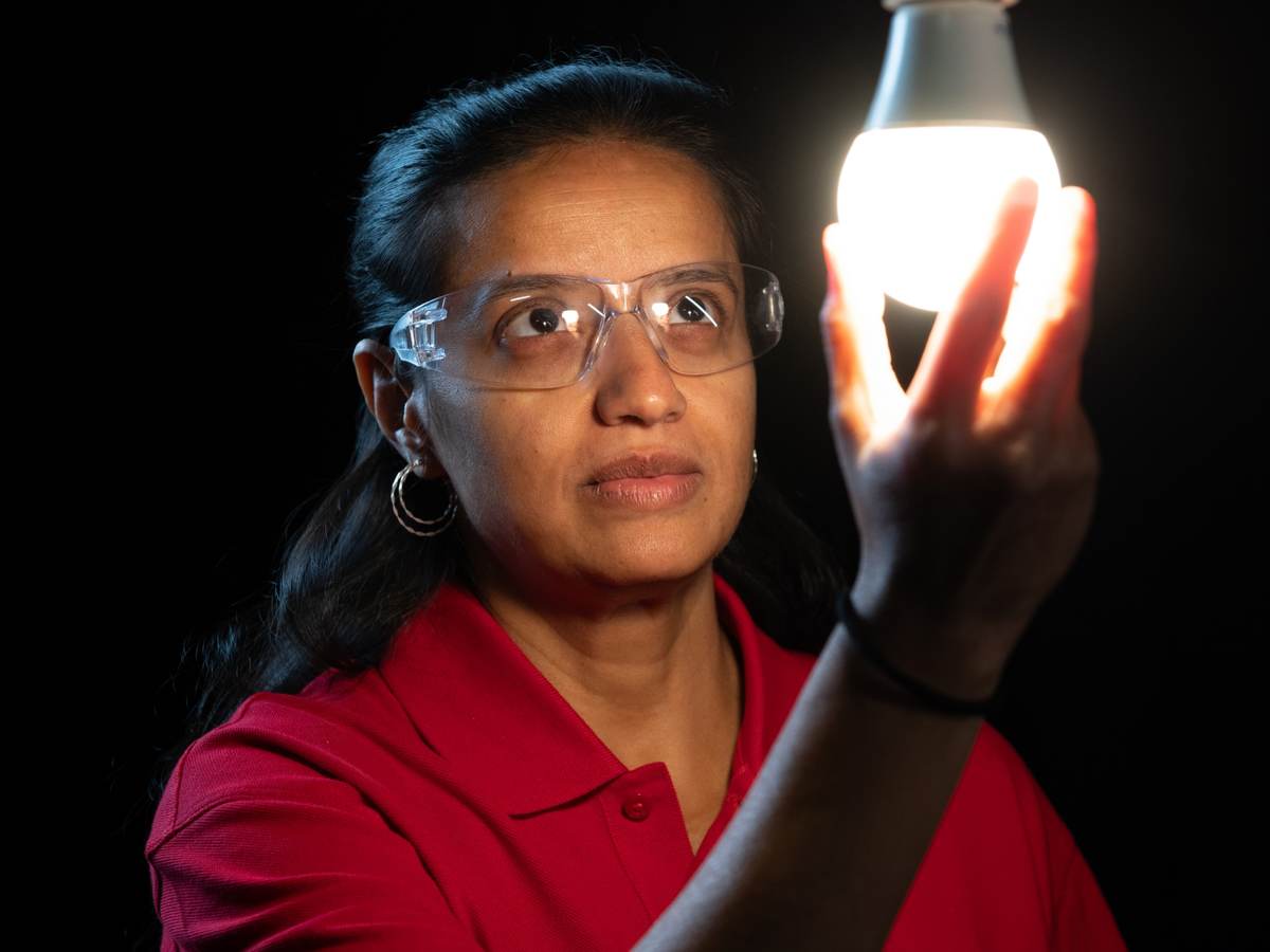 Woman testing lights.