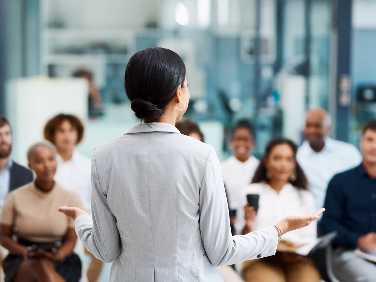 Businesswoman giving a presentation in the office boardroom.