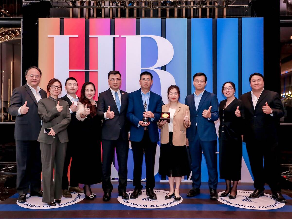 UL Solutions employees represent the company at an awards ceremony in Shanghai on Nov. 3, 2023. 
