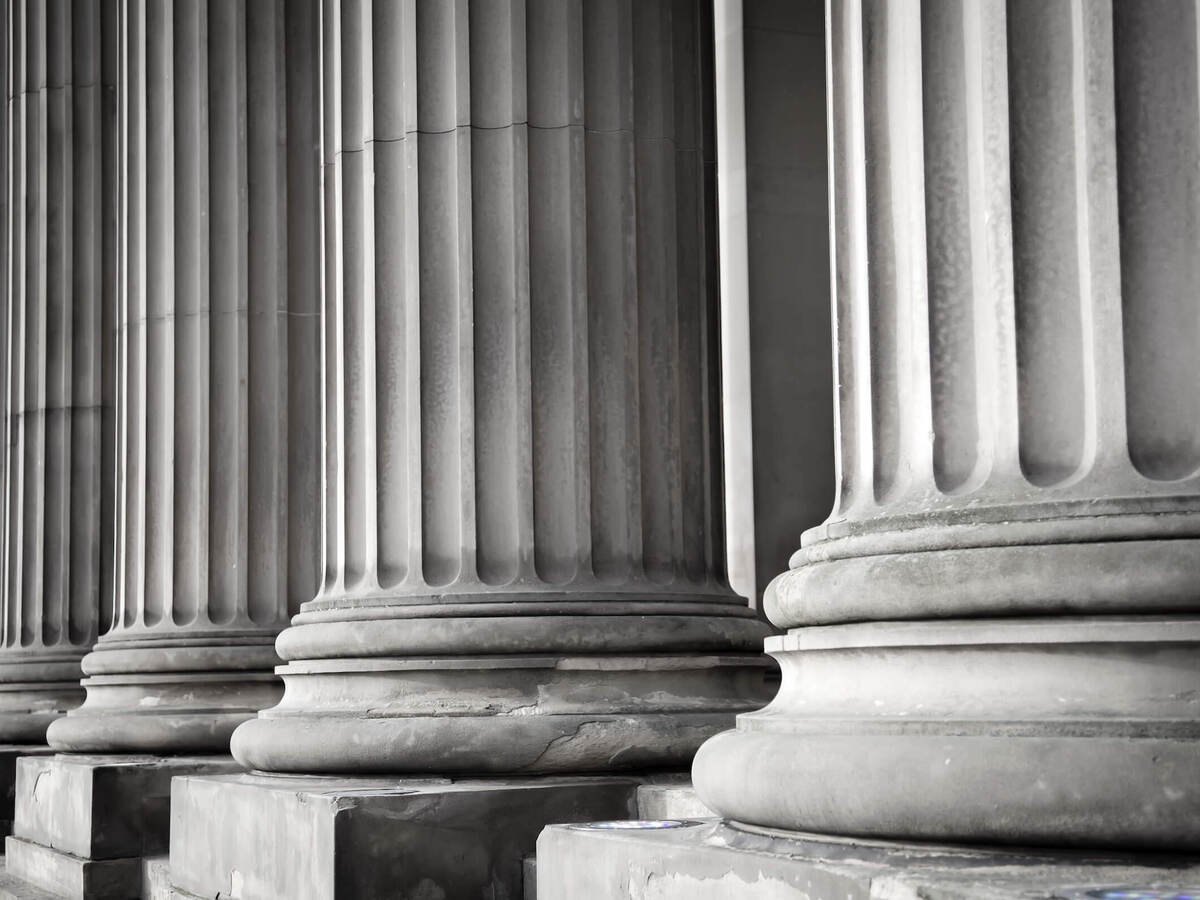 Closeup of columns in front of a building