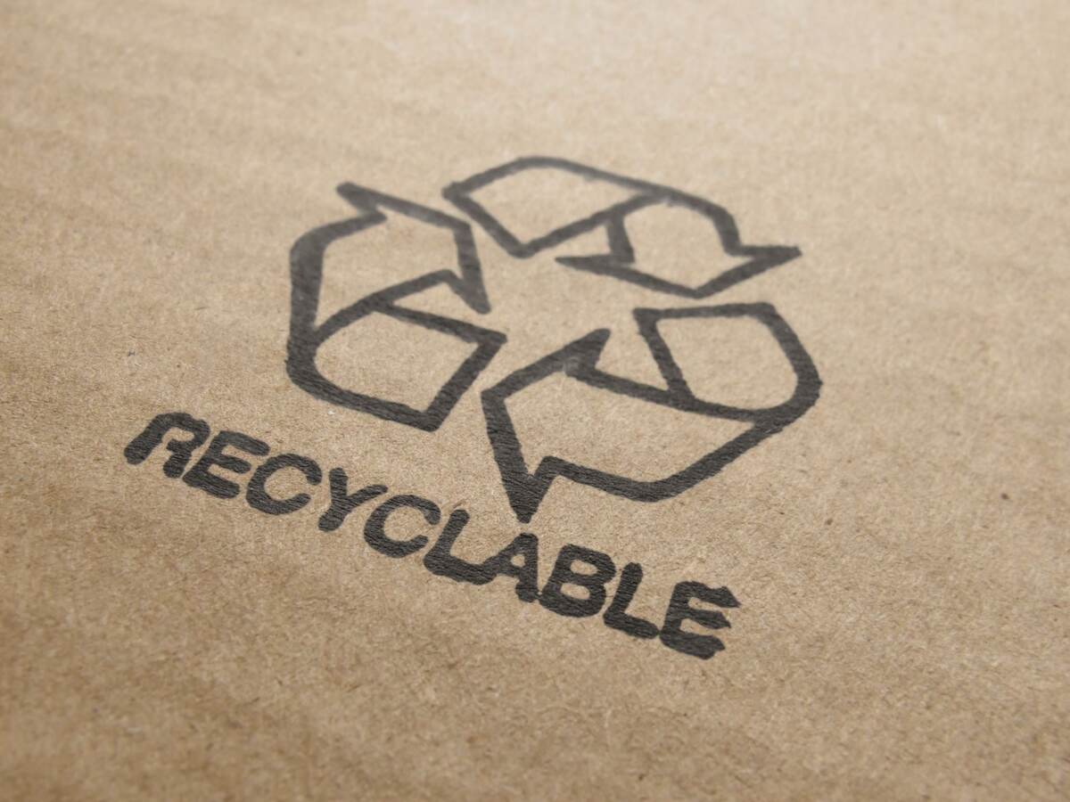 Recyclable icon on cardboard box.