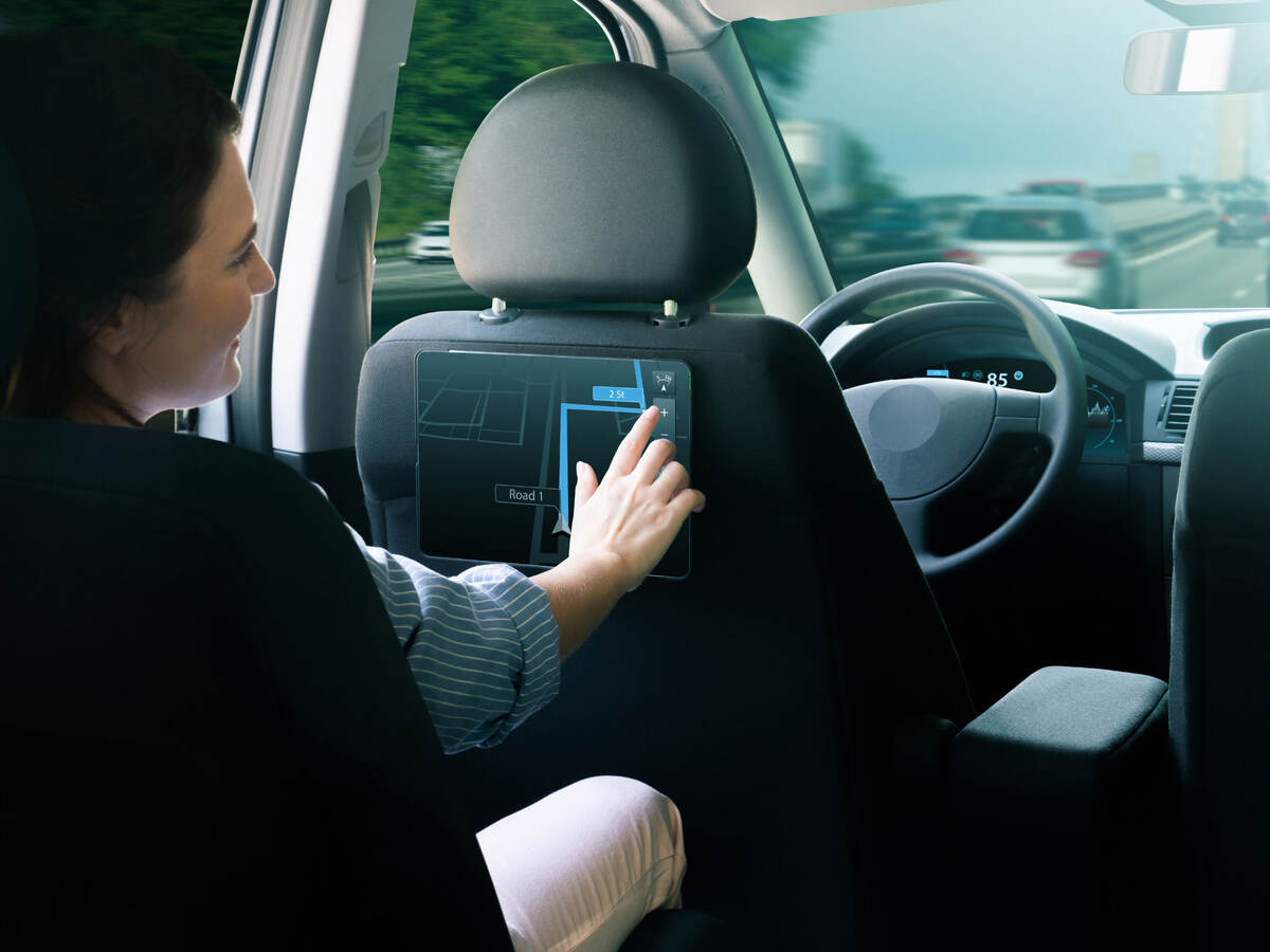 A passenger in an autonomous taxi