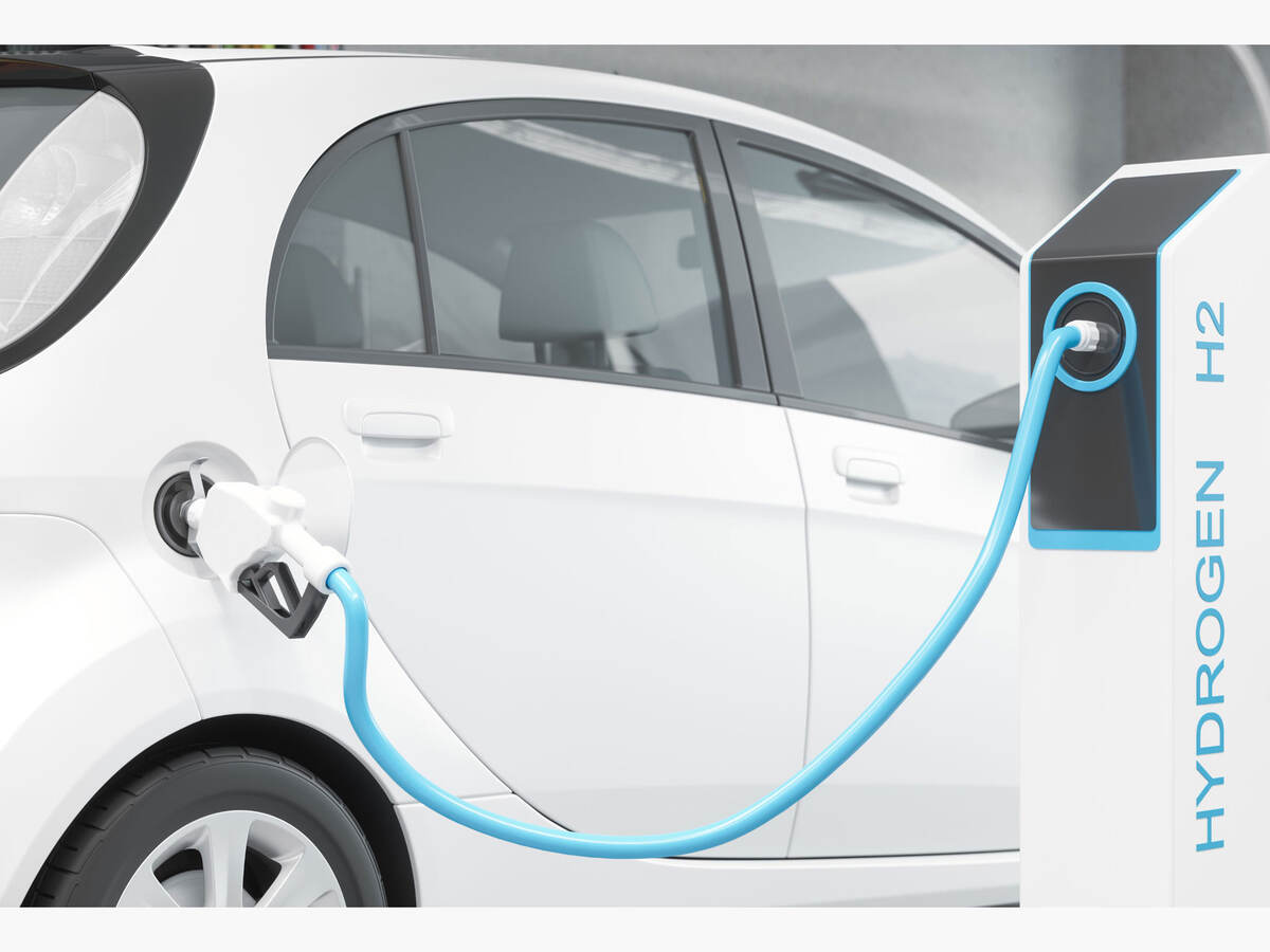 A car at a hydrogen fuel filling station