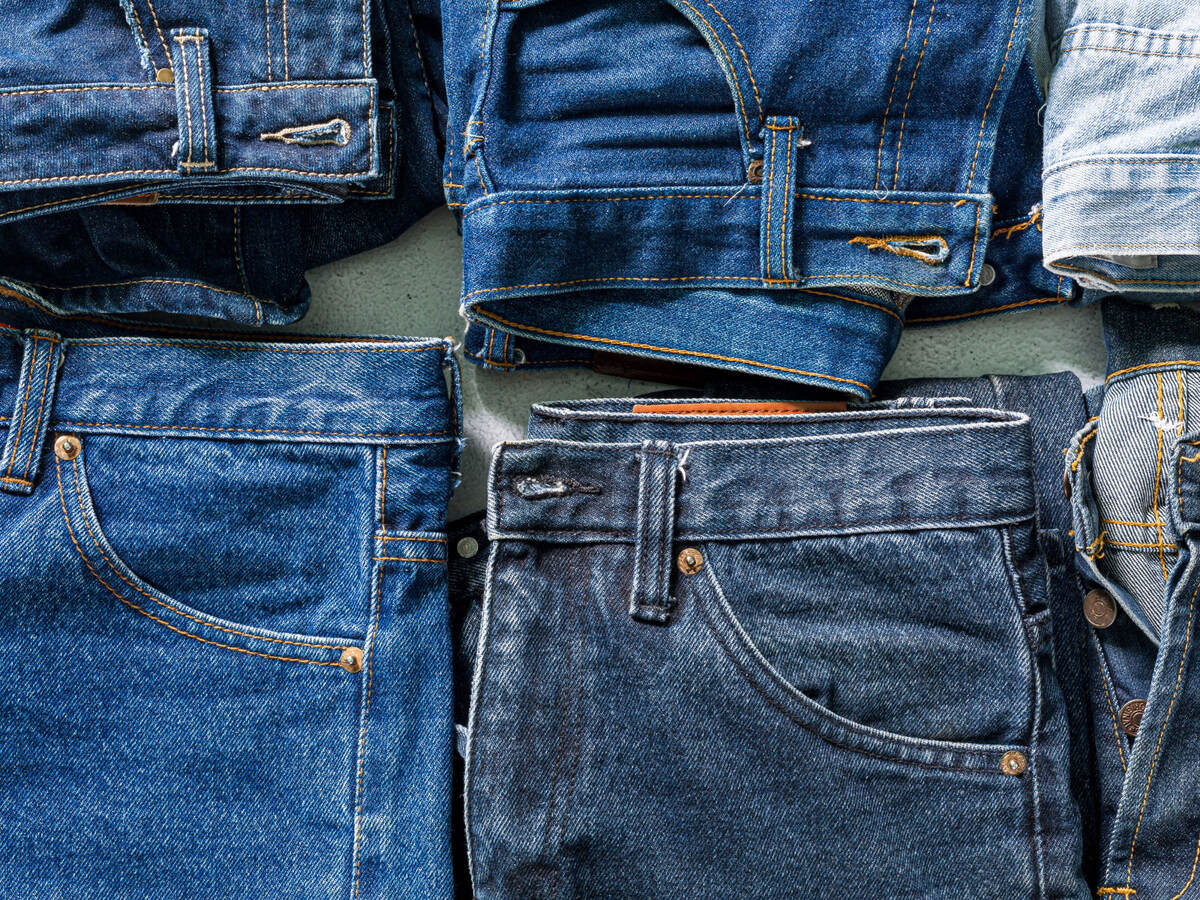 Several pairs of folded jeans