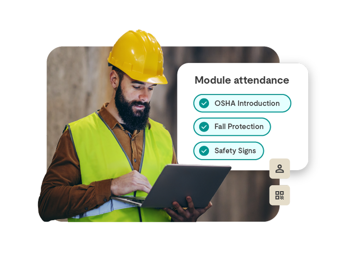 Construction worker using a laptop to confirm module attendance
