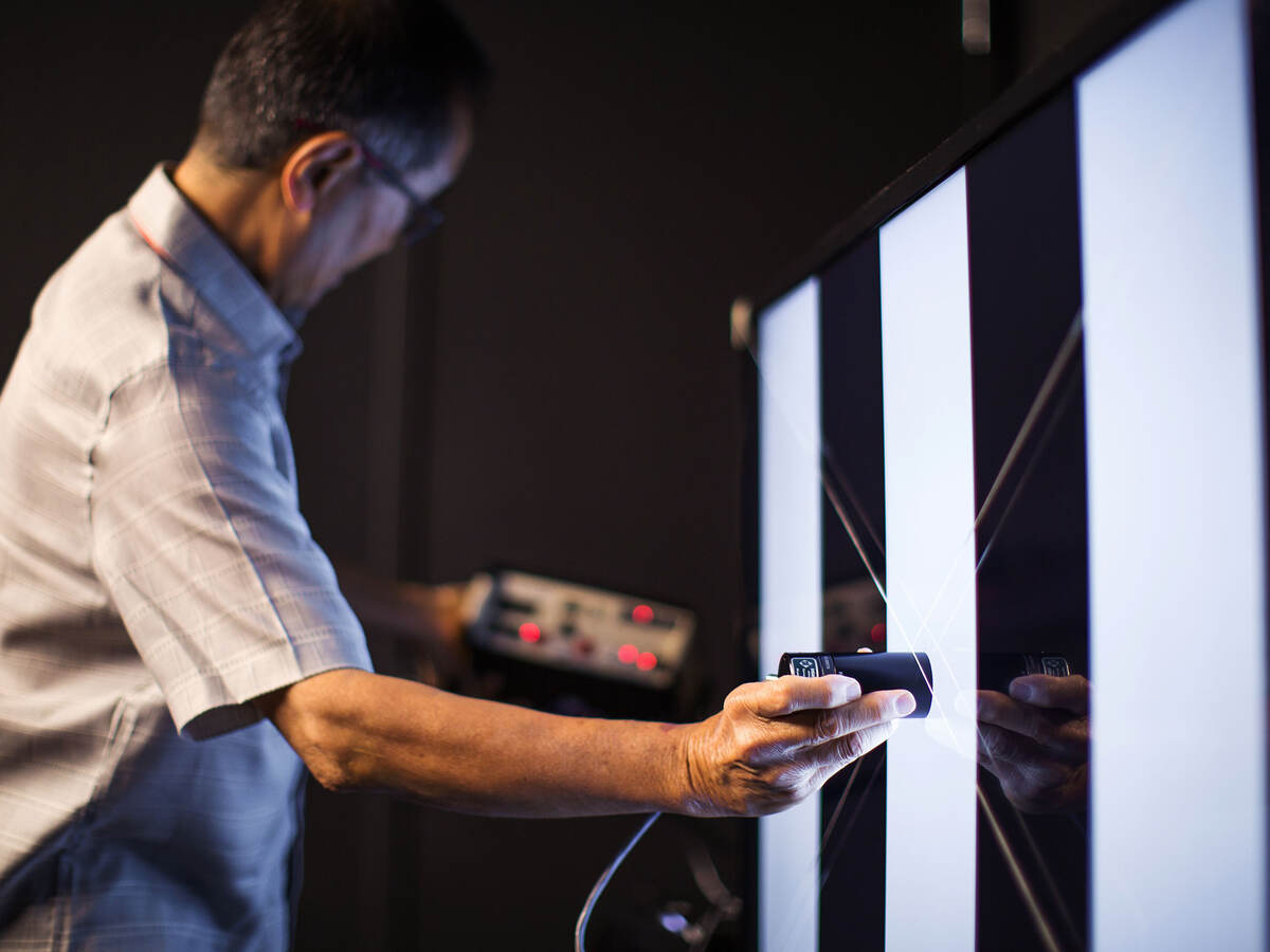 A person testing energy efficiency