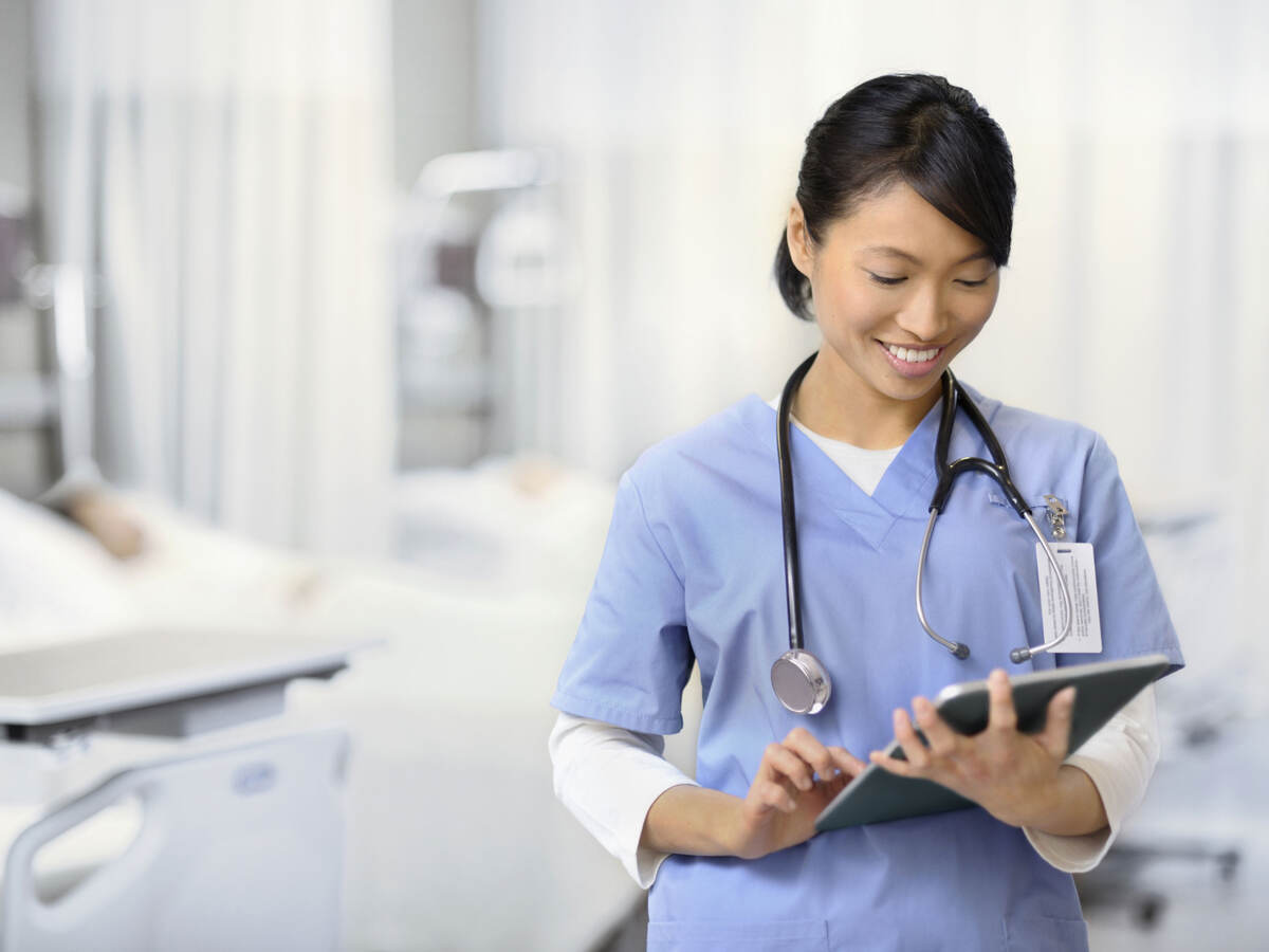 Doctor checking a chart in a hospital