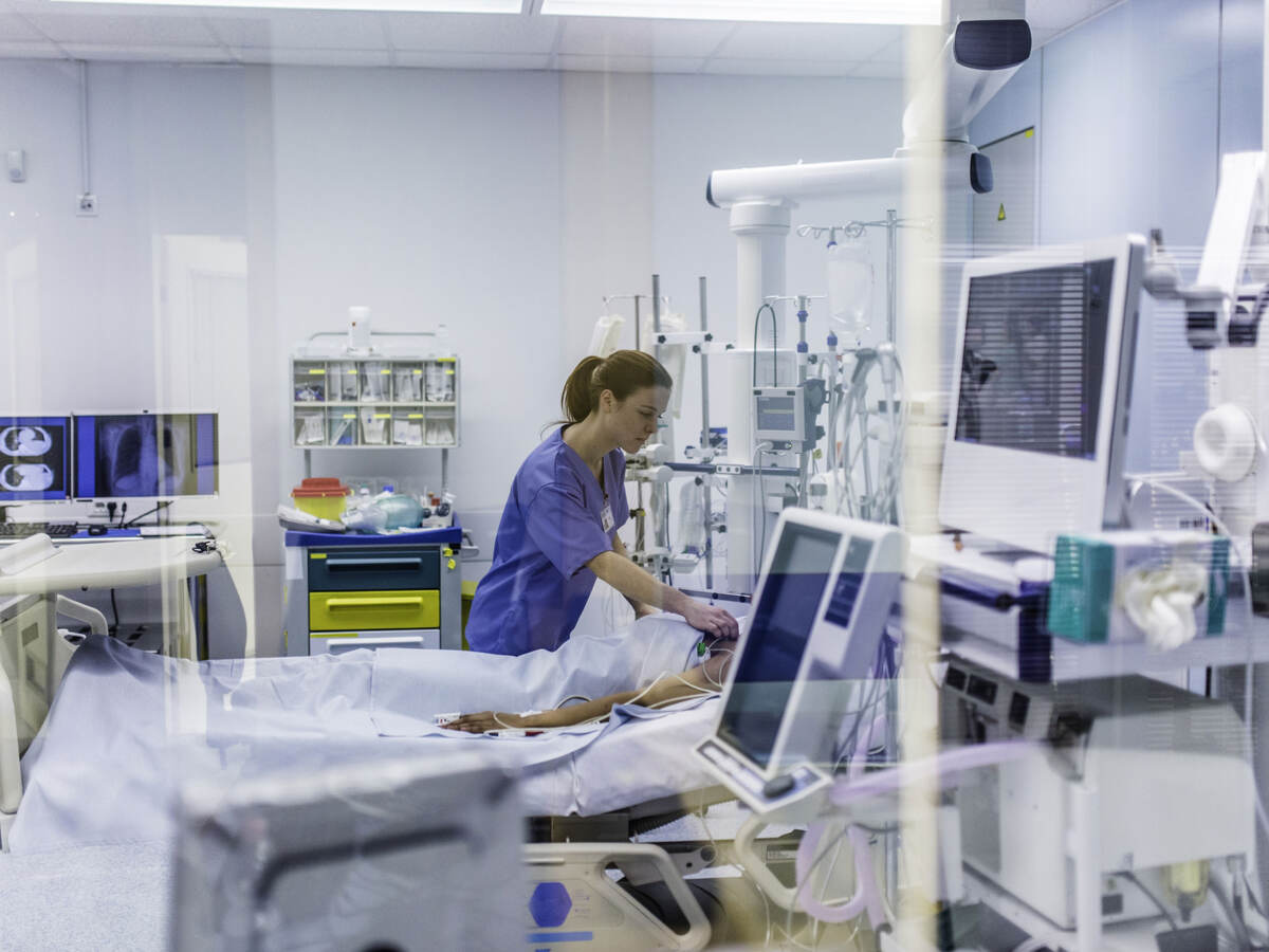 Doctor checking on a patient in a hospital
