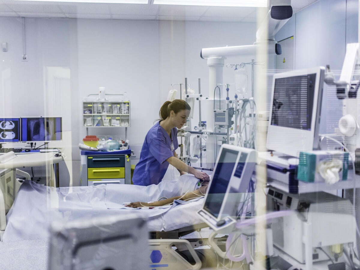 Doctor checking on a patient in a hospital