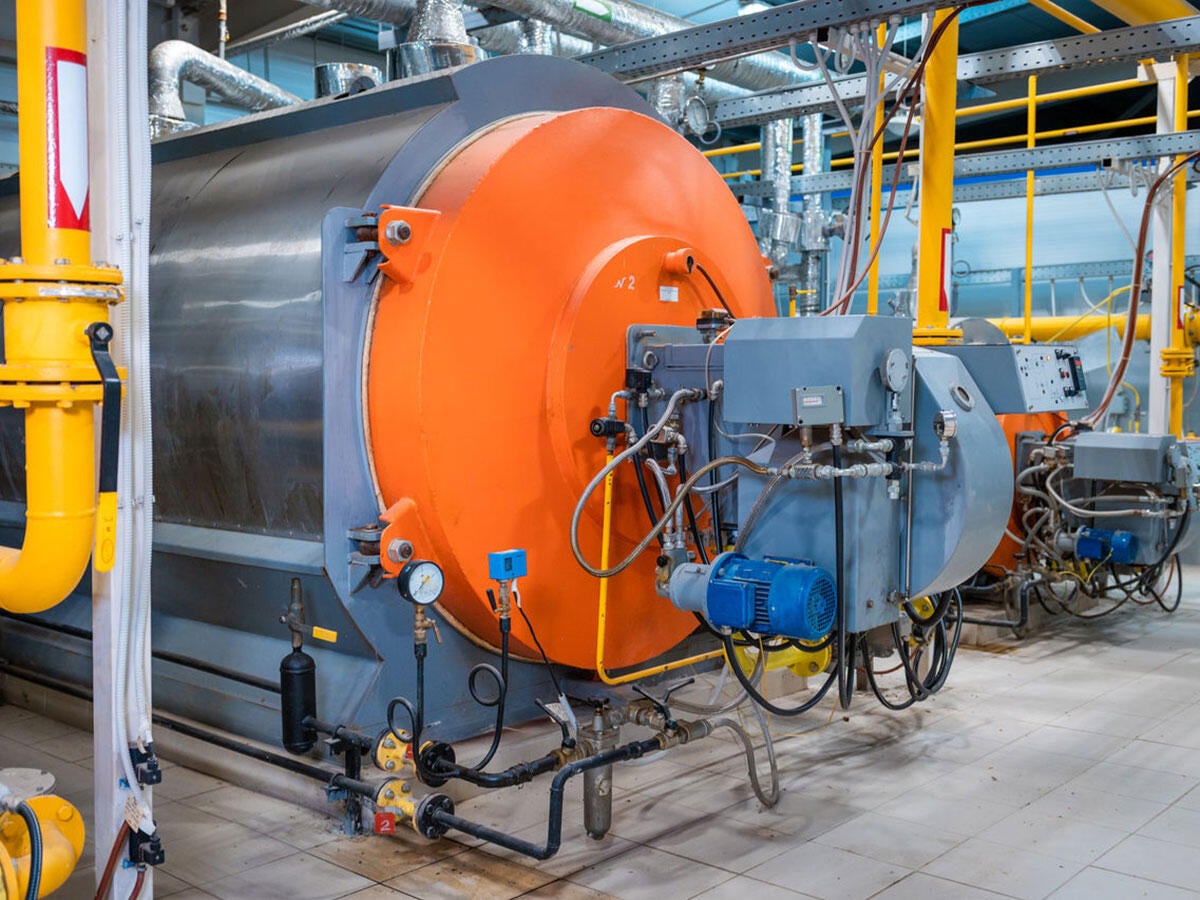 Industrial heating pipes and a large boiler