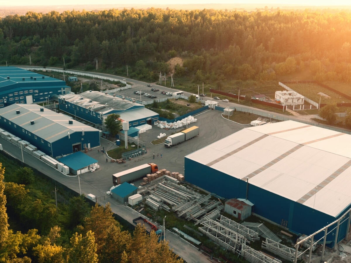 Overhead view of a factory at sunrise