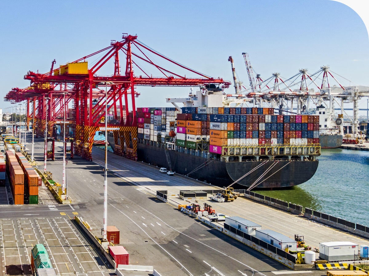 Elevated view of a container ship loading/unloading cargo