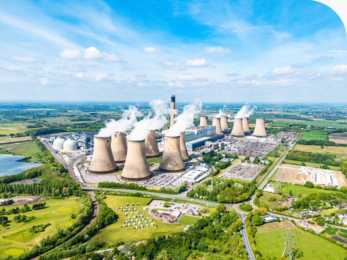 Overhead view of a power station giving off emissions