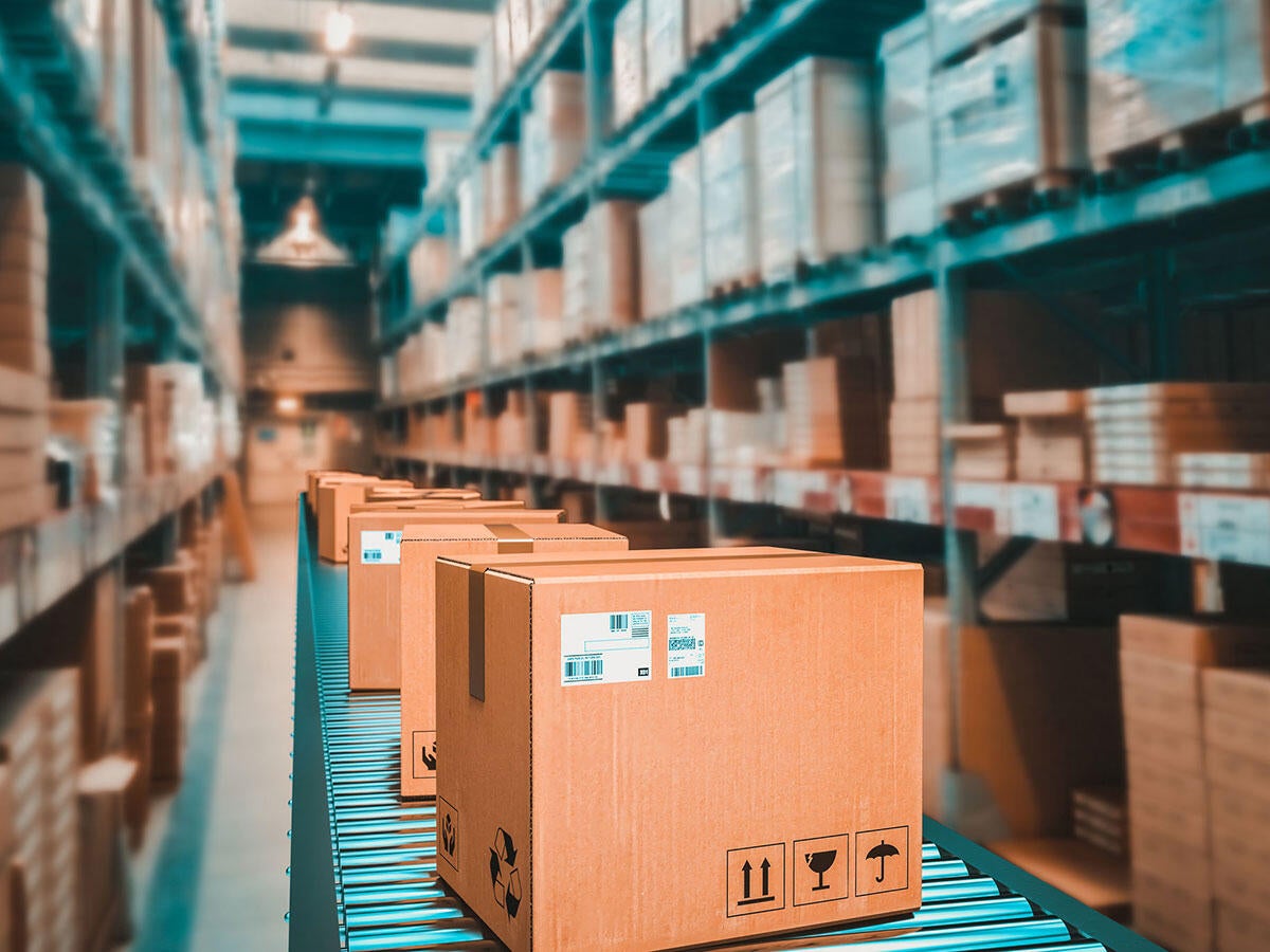 Parcels on conveyer belt in a warehouse