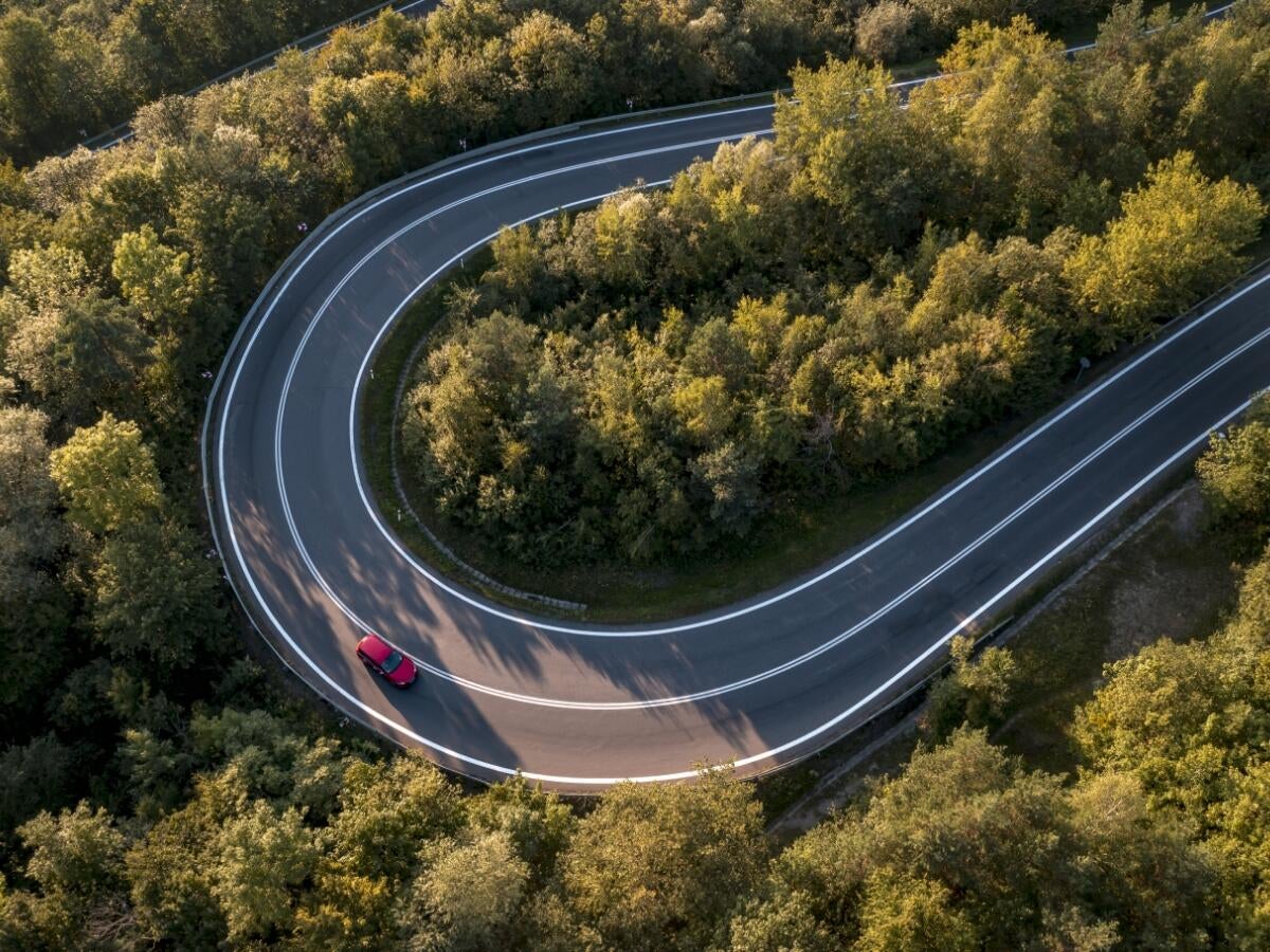curving road in wooded area