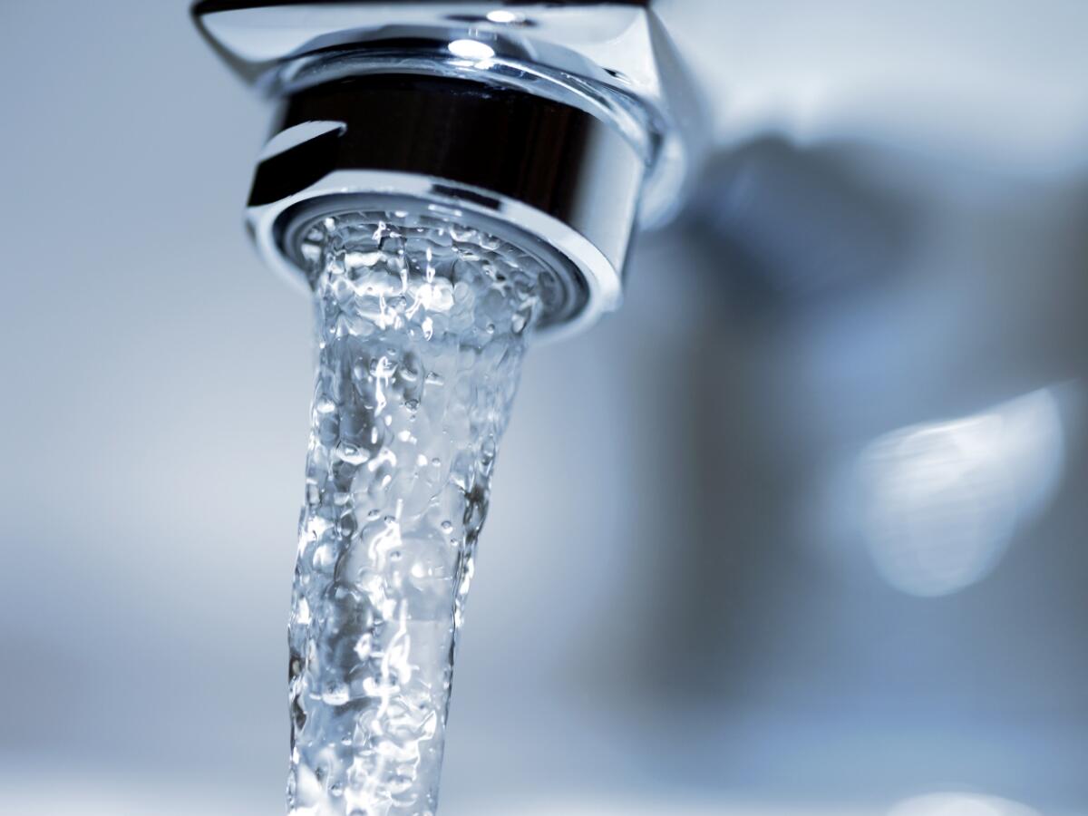 tap water pouring out faucet