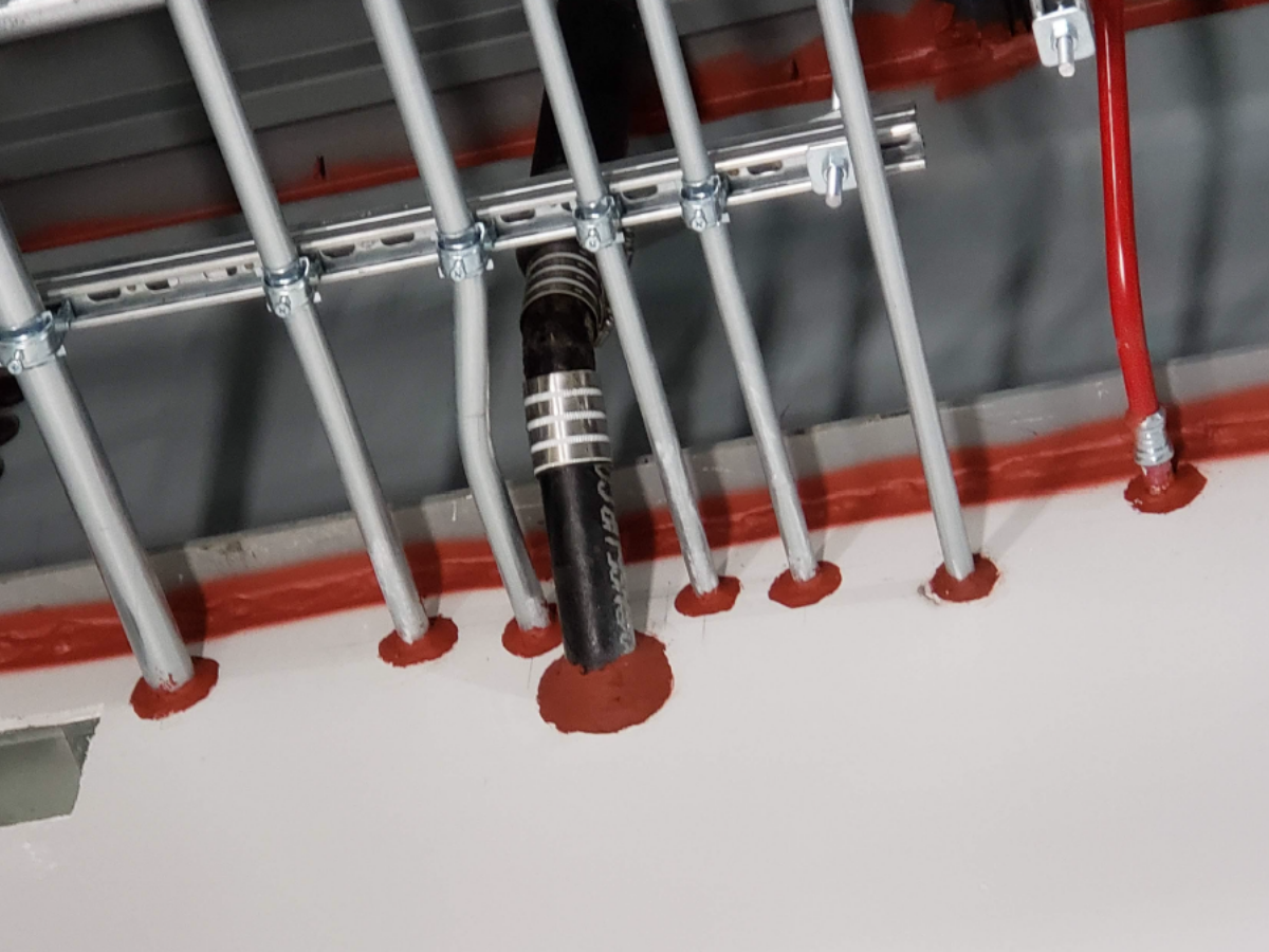 Fire Resistance-Rated Walls Adjoining Unprotected Steel Beams