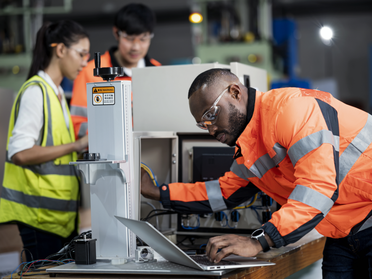 people wearing safety gear and working