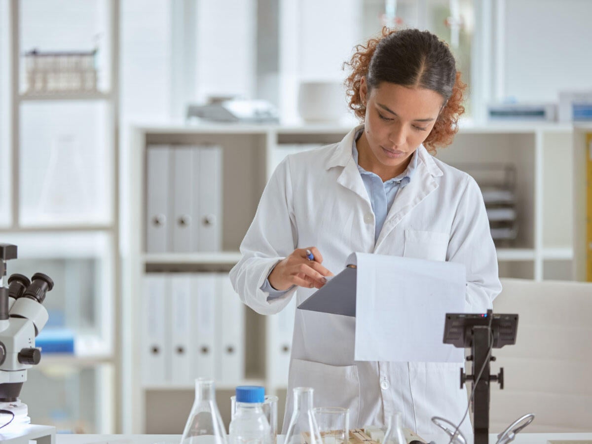 chemistry lab technician analyzing results 