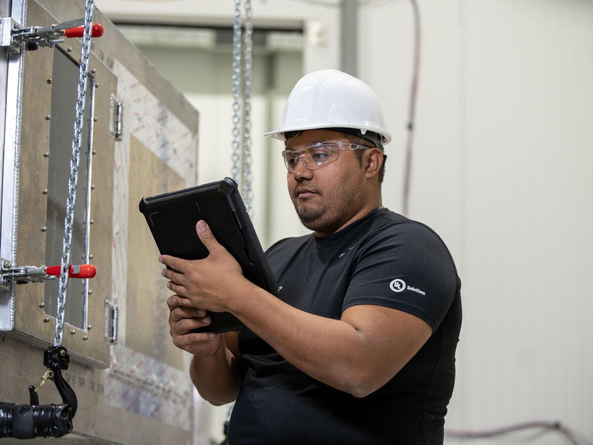 A UL Solutions employee testing an HVAC system